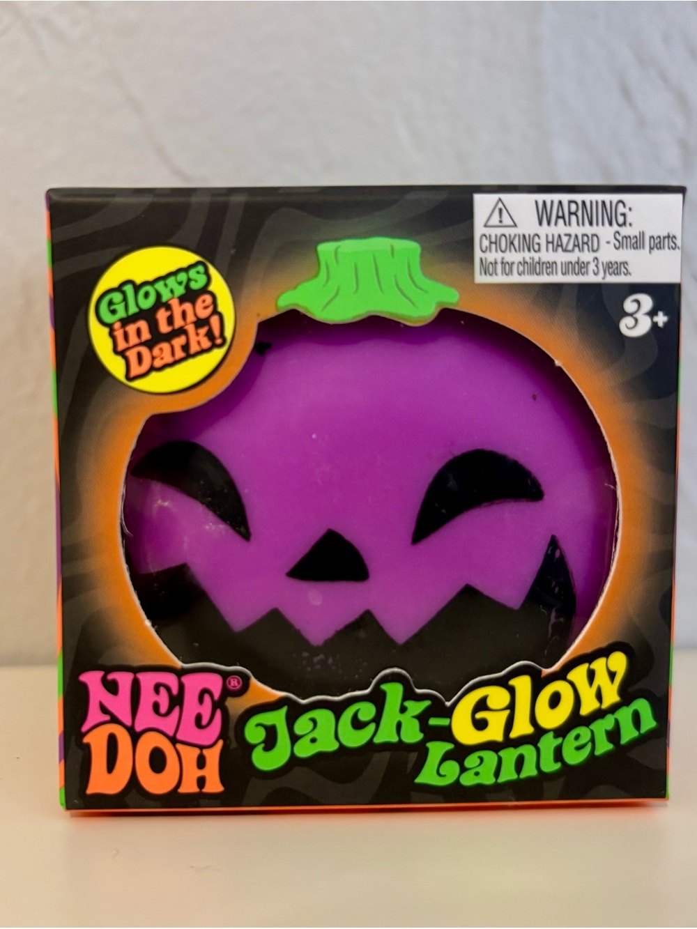 Schylling Purple Jack-O-Lantern Pumpkin Glows in the Dark Fidget Toy